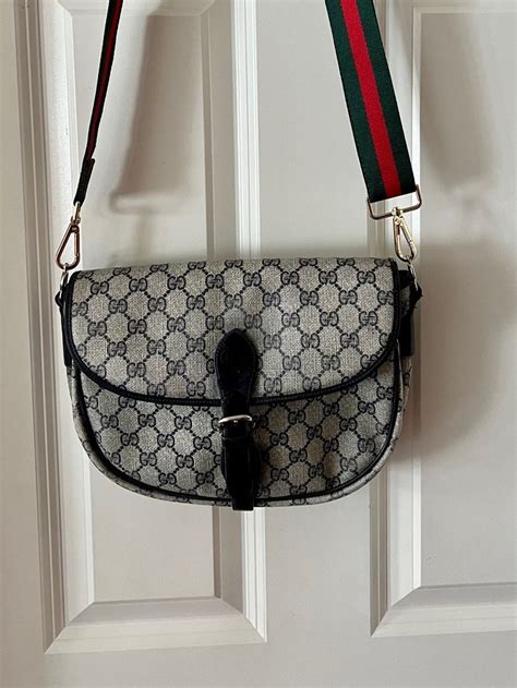 gucci saddle bag replica|does gucci still make guccissima.